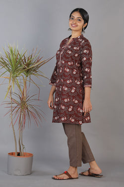 Collection of Bagru handblock printed thread embroidered  panelled kurti in a gallery layout