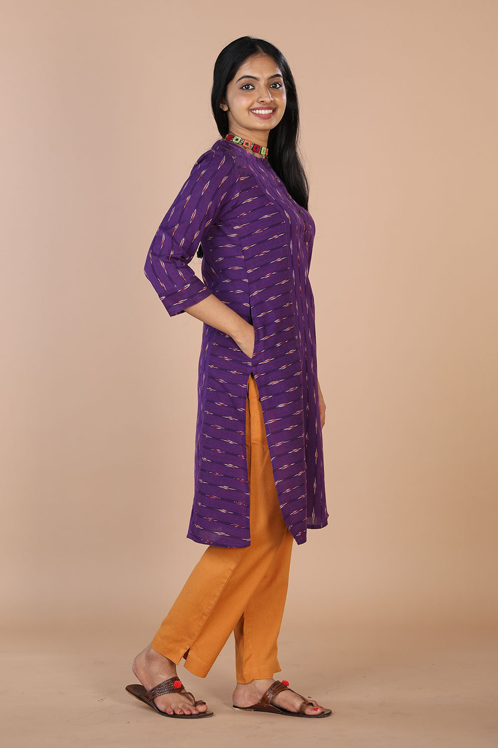 Collection of Striped purple straight fit  Pochampally Ikkat kurti. in a gallery layout