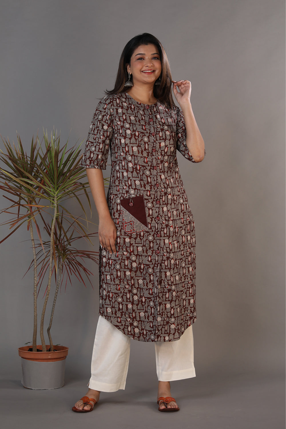 Bagru hand block printed kurti with thread embroidery.