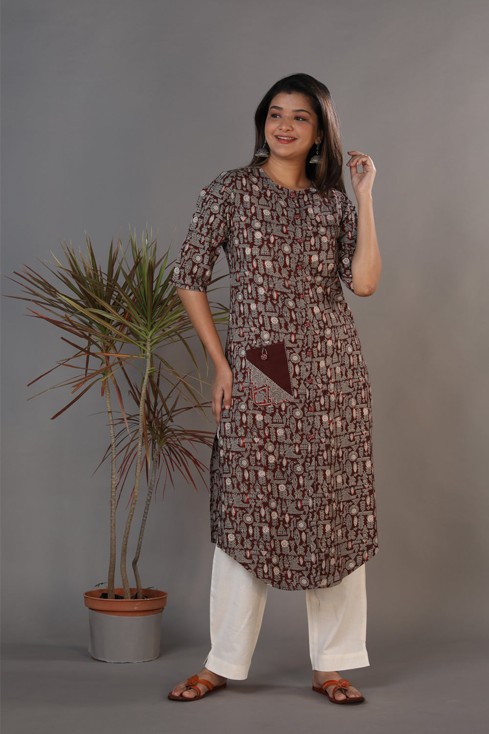 Bagru hand block printed kurti with thread embroidery.