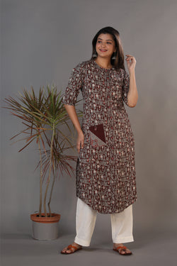 Image of Bagru hand block printed kurti with thread embroidery.