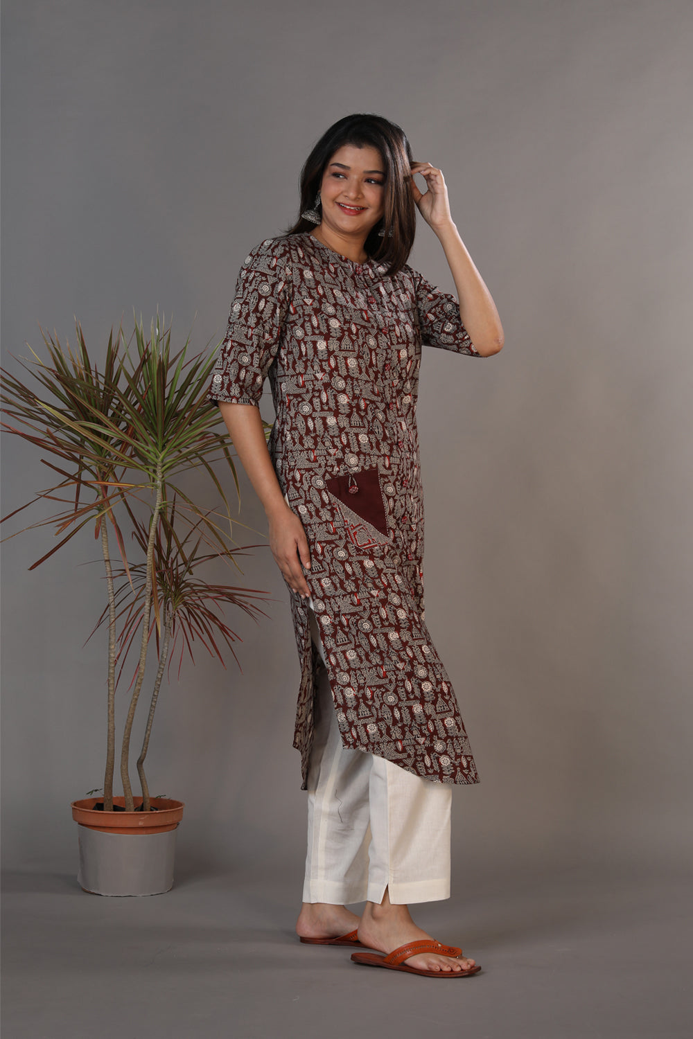 Collection of Bagru hand block printed kurti with thread embroidery. in a gallery layout