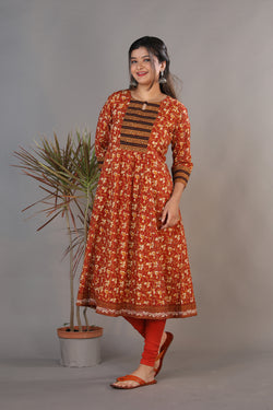 Collection of Maroon handblock printed gathered Bagru kurti. in a gallery layout