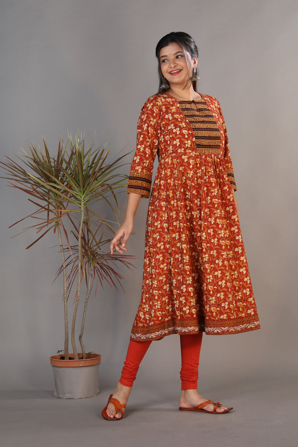 Collection of Maroon handblock printed gathered Bagru kurti. in a gallery layout