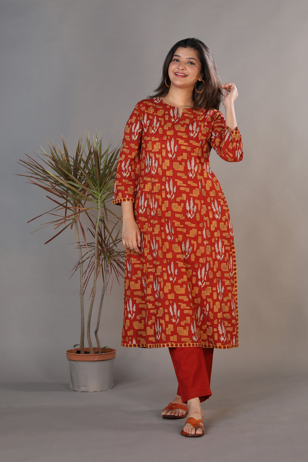 Collection of Bright maroon hand block printed Bagru cotton kurti. in a gallery layout