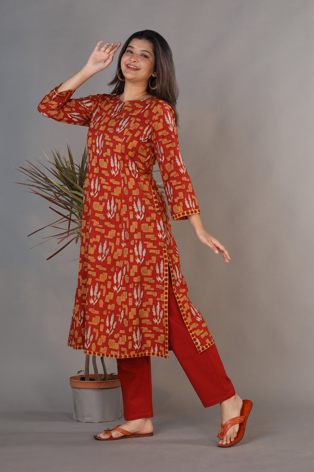 Collection of Bright maroon hand block printed Bagru cotton kurti. in a gallery layout