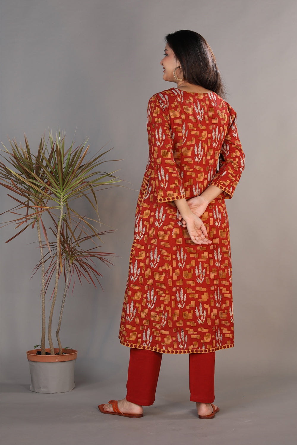 Collection of Bright maroon hand block printed Bagru cotton kurti. in a gallery layout