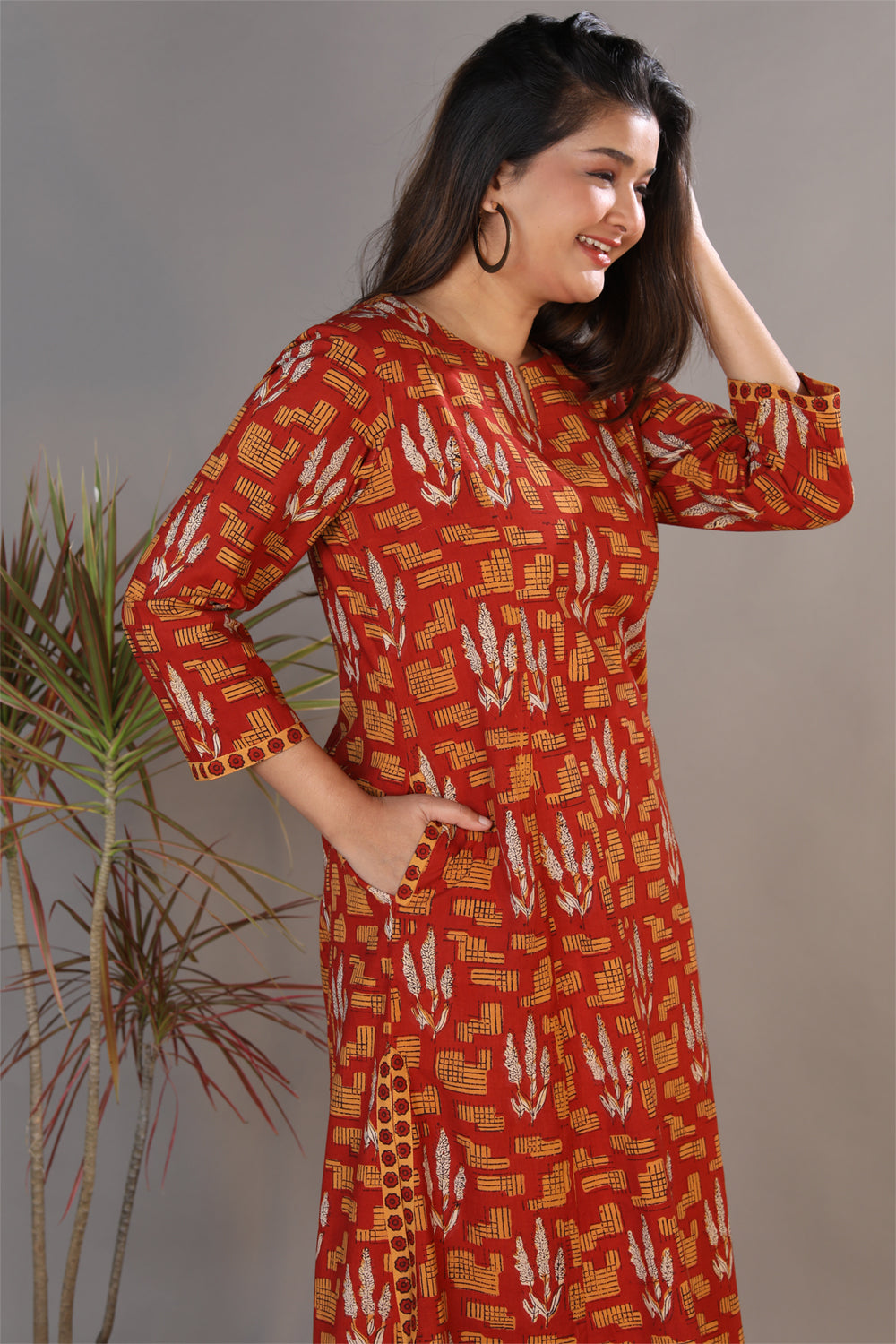 Collection of Bright maroon hand block printed Bagru cotton kurti. in a gallery layout