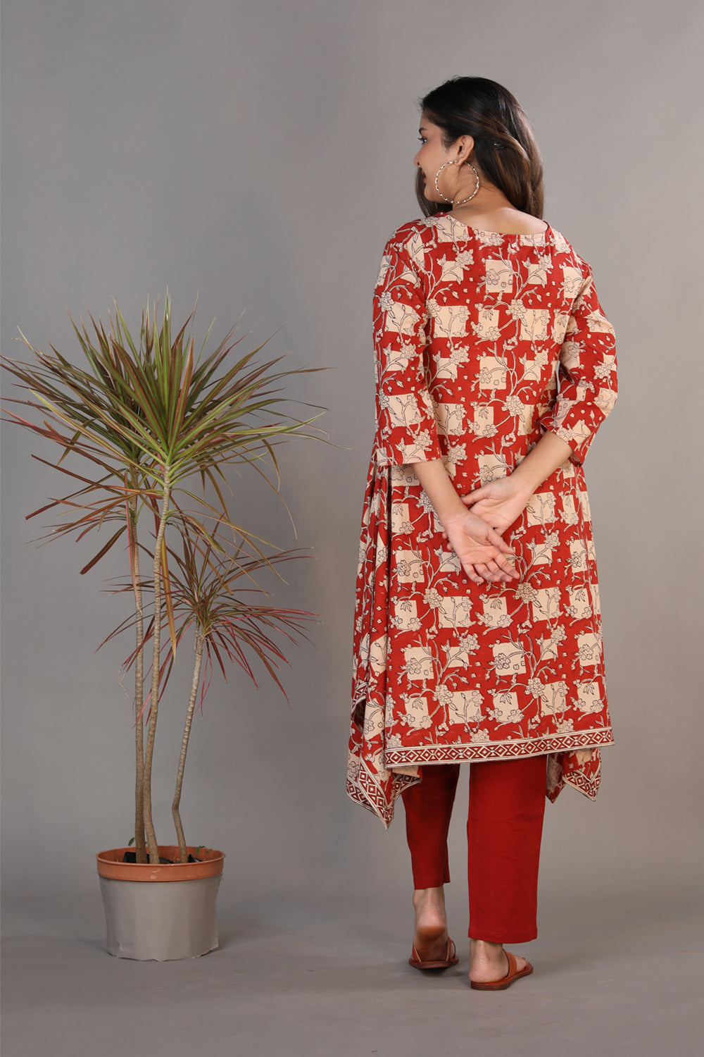 Collection of Bright maroon hand block printed Bagru cotton kurti. in a gallery layout