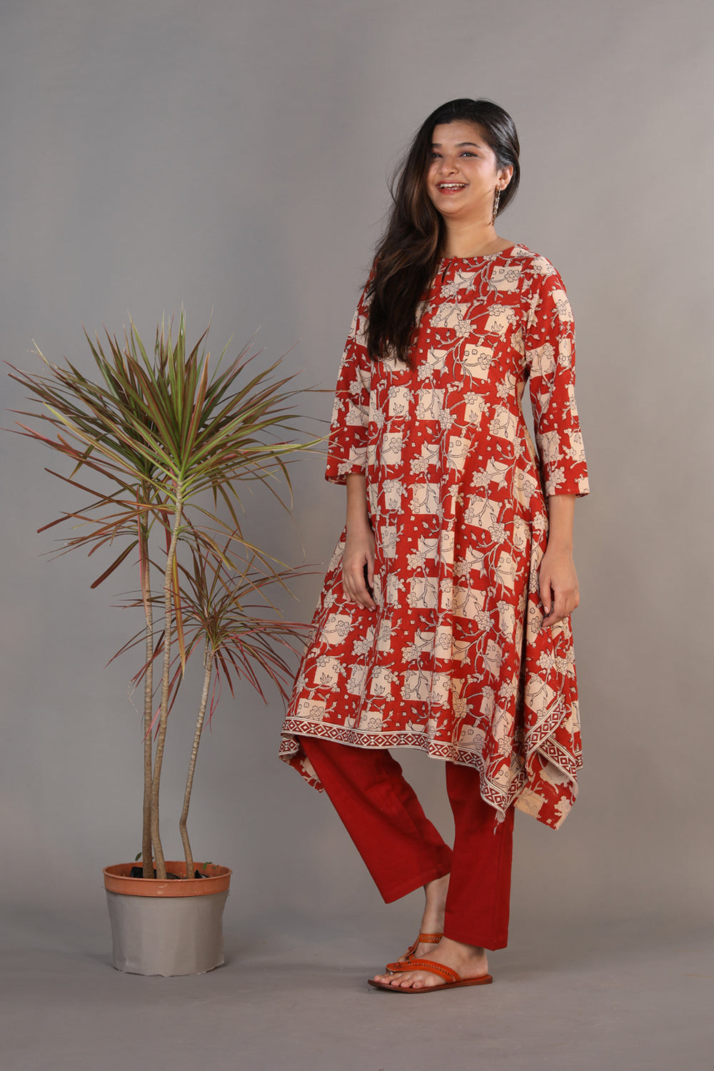 Collection of Bright maroon hand block printed Bagru cotton kurti. in a gallery layout