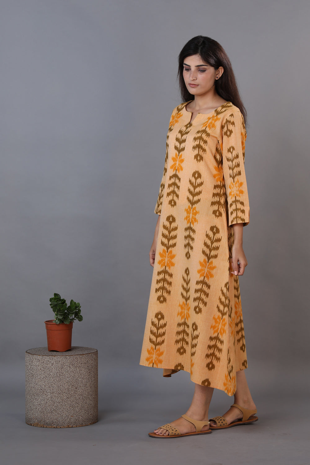 Collection of Honey beige hand woven cotton Ikat kurti in a gallery layout