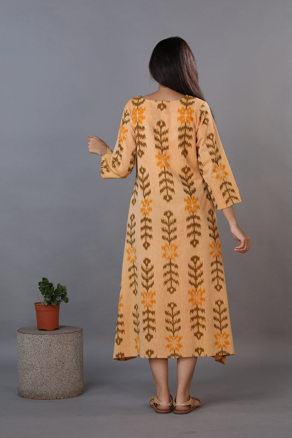 Collection of Honey beige hand woven cotton Ikat kurti in a gallery layout