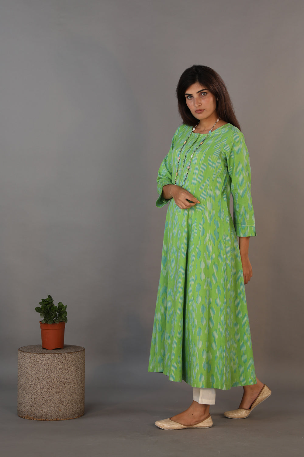 Collection of Basil green hand woven cotton Ikat dress in a gallery layout