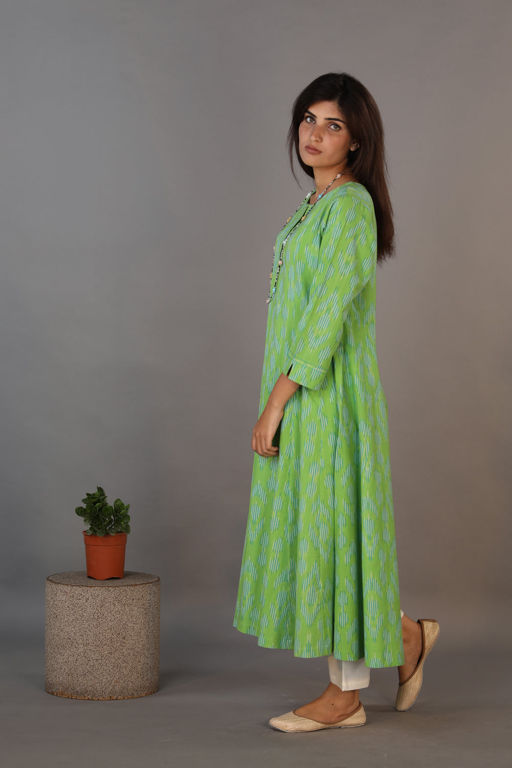 Collection of Basil green hand woven cotton Ikat dress in a gallery layout