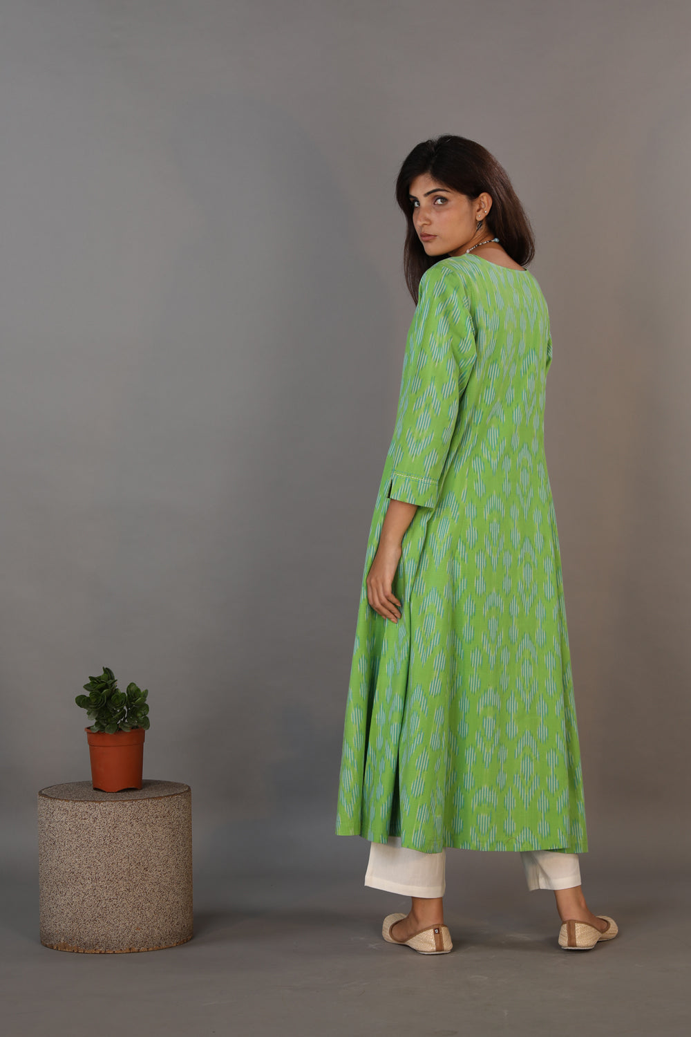 Collection of Basil green hand woven cotton Ikat dress in a gallery layout