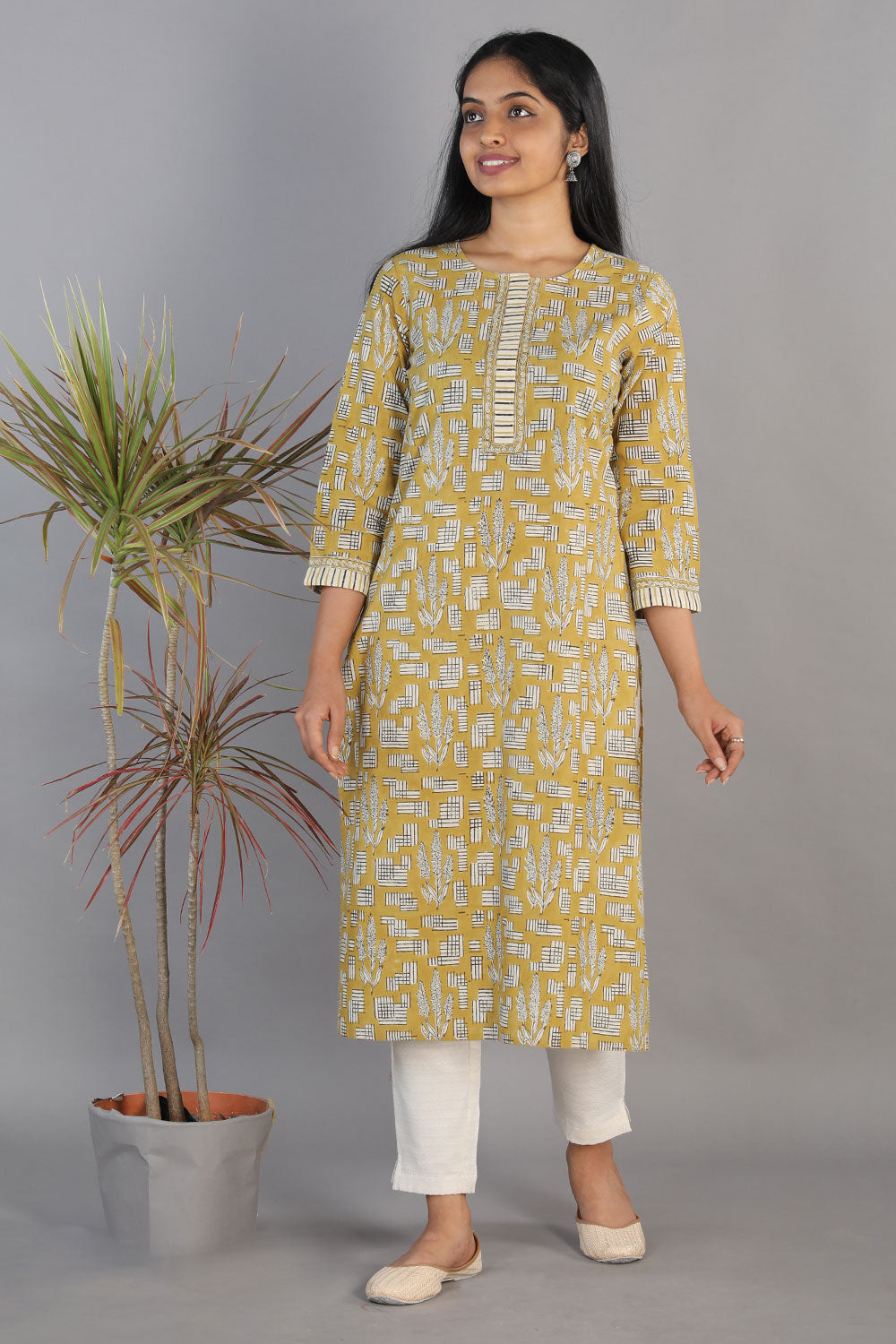 Collection of Mustard Bagru Block printed kurti in a gallery layout