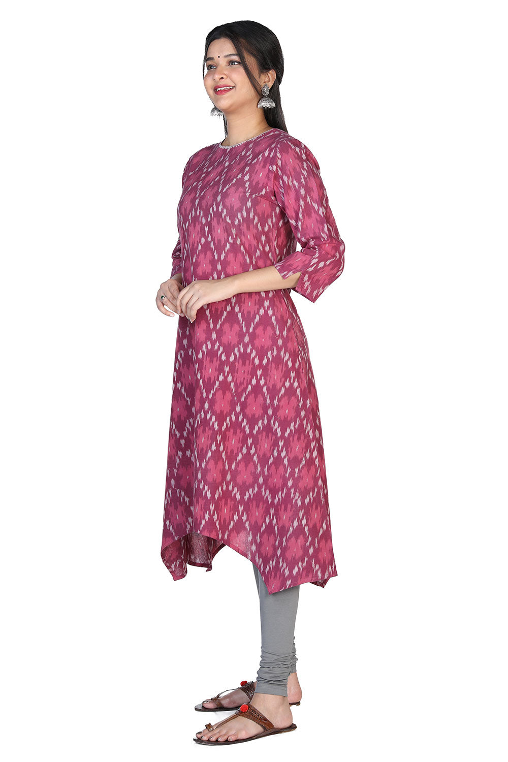 Collection of Magenta double ikat flared kurta in a gallery layout