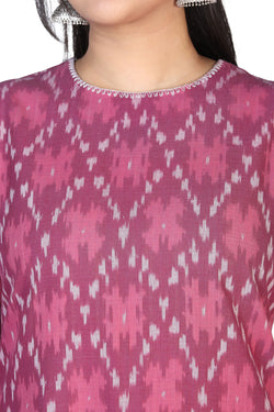 Collection of Magenta double ikat flared kurta in a gallery layout