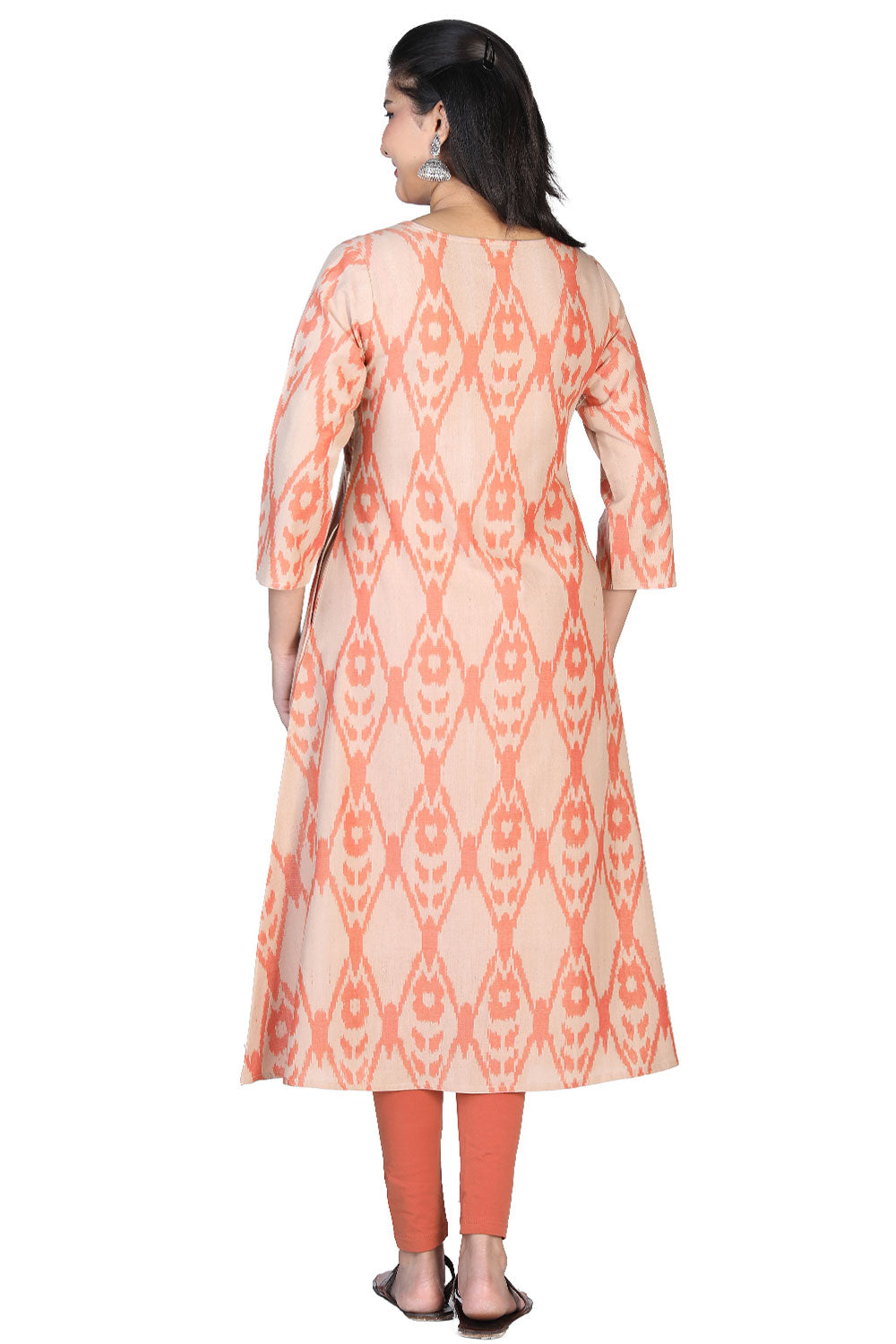 Collection of Salmon coloured cotton ikat kurti in a gallery layout