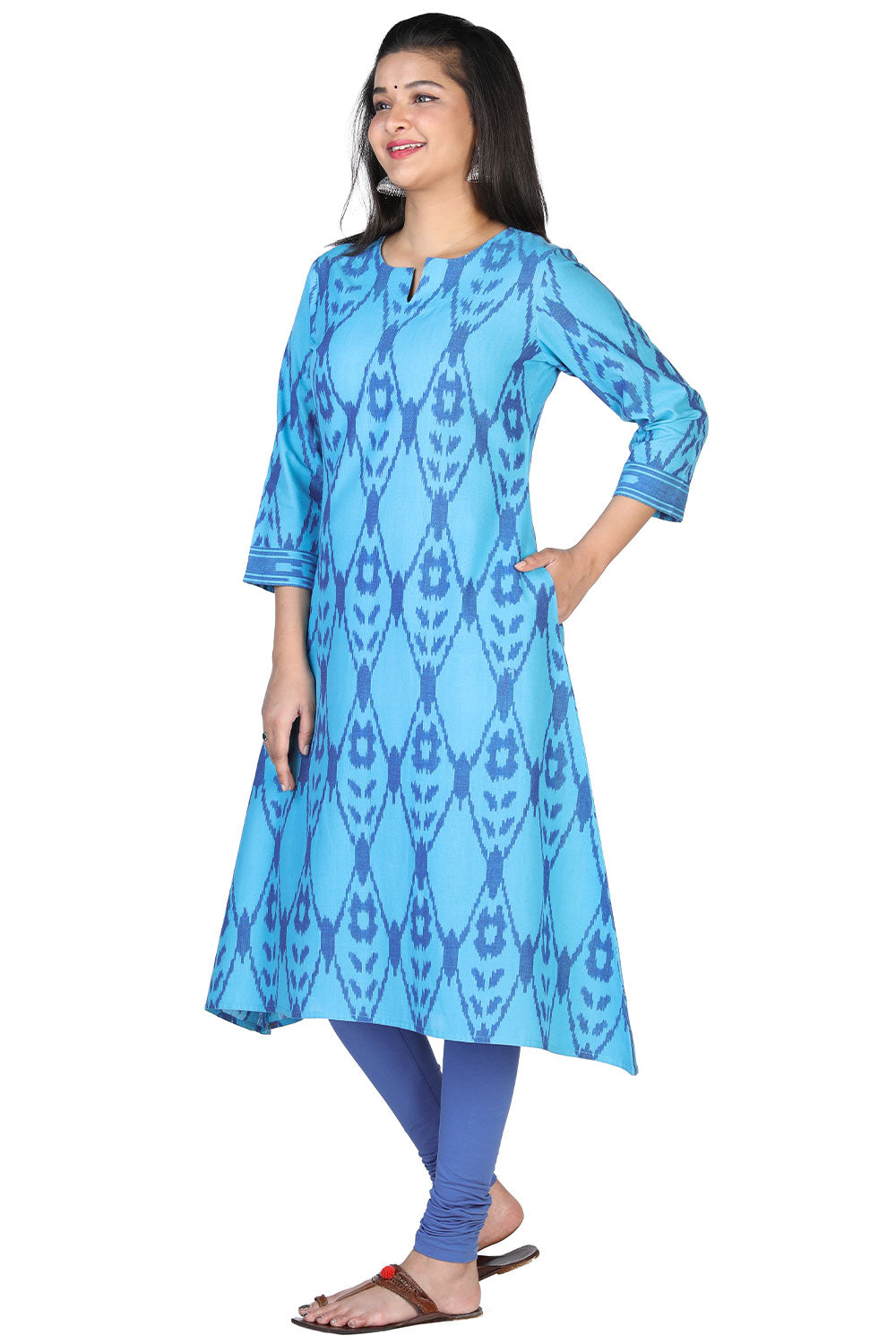 Collection of Turquoise blue cotton ikkat kurti in a gallery layout