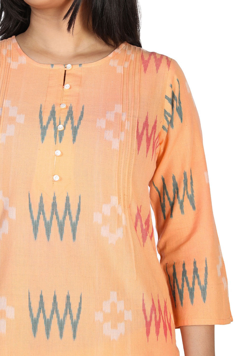 Collection of Orange peel cotton ikkat kurti in a gallery layout