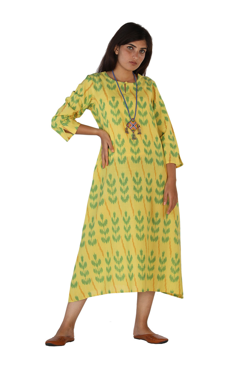 Collection of Lemon yellow flared Ikat Pochampally kurti. in a gallery layout